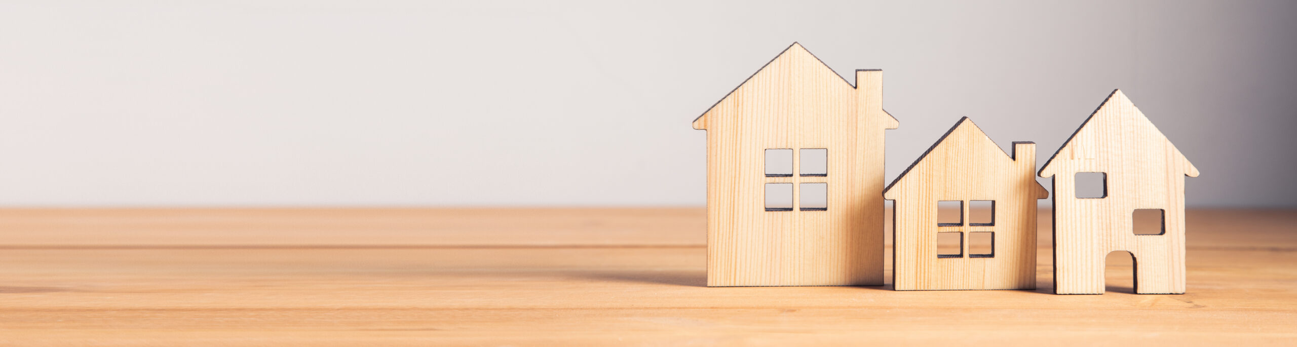 real estate, wooden house models on table